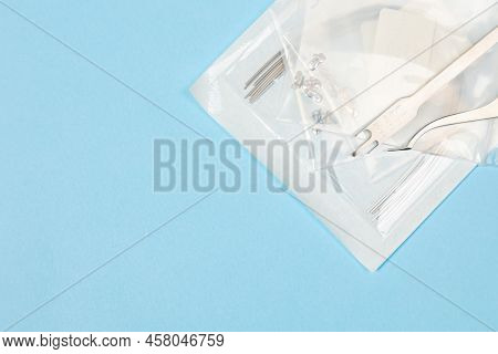A Set Of Special Tools For An Orthodontist To Install Braces For A Patient. Orthodontic Arcs, Ligatu