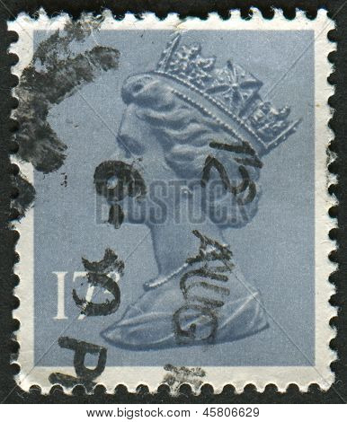 UK-CIRCA 1983:A stempel trykt i UK viser billede af Elizabeth II er den forfatningsmæssige monark af 16 