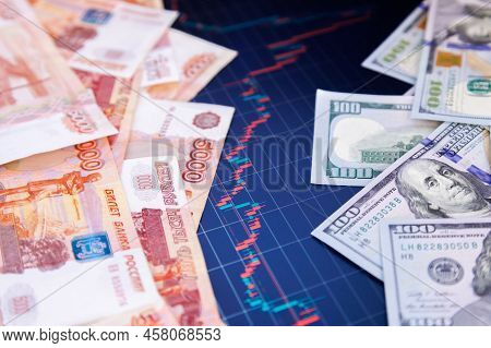 Us Dollar And Russian Ruble Banknotes Over Digital Screen With Real Life Exchange Chart, Usd Rub Dep