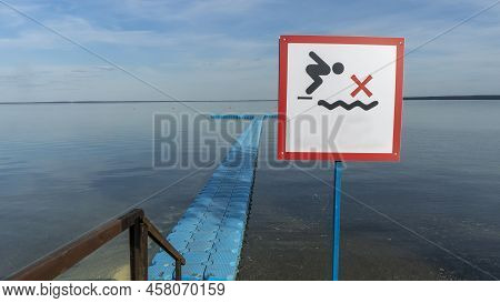 No Diving Sign At Beach, Lake Naroch, Belarus. Warning Sign Of Shallow Water. Warning Notice Sign Do