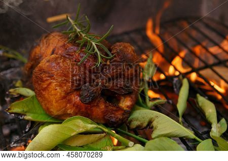 Roast Chicken Barbecue With Lemon Leaves, Outside Private House On A Public Holiday