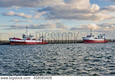 July, 09, 2022: Red And White Fishing Boats Moored In The Harbour In The Town Of Hel. Hel, Hel Penin