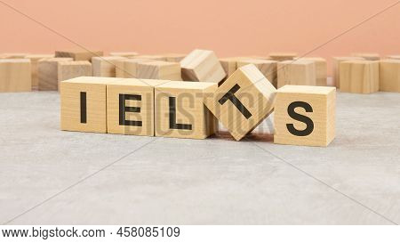 Ielts Symbol. Beautiful Orange And Gray Background. Copy Space. Ielts - Acronym International Englis