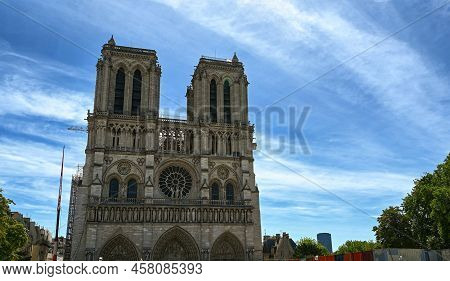 Paris, France. June 2022. Nice View Of The Notre Dame Facade. The Crane Of The Restoration Site Is V