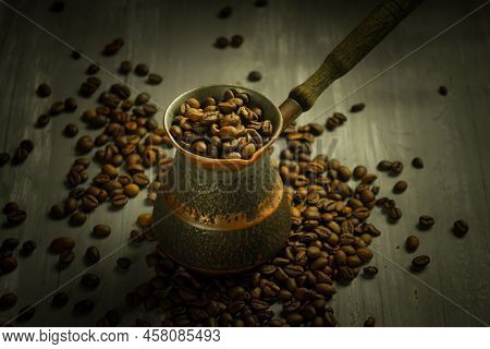 Black Roasted Coffee Beans. Cezva Cup Coffee Glass Rustic Style Turkish Ground Coffee