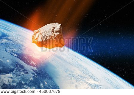 Planet Earth And Big Asteroid In The Space. Potentially Hazardous Asteroids. Asteroid In Outer Space