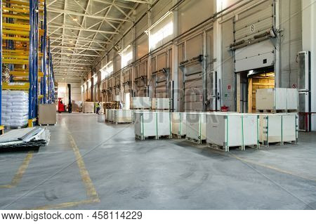 General View To The Loading Gates Inside The Warehouse.interior Of A Modern Warehouse Storage. Truck