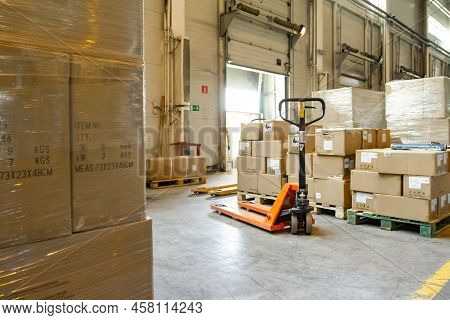 Group Of Boxes In Storehouse. Pallets With Carton Boxes. Interior Of A Modern Warehouse Storage