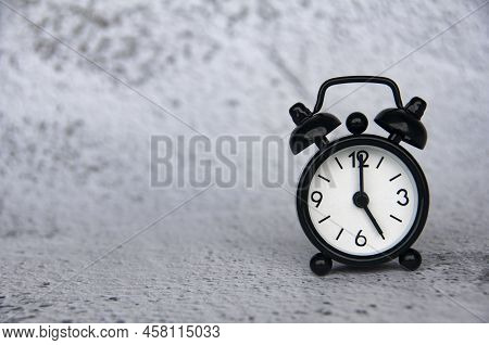 Alarm Clock Pointing At 5 Oclock With Customizable Space For Ideas Or Text. Copy Space.