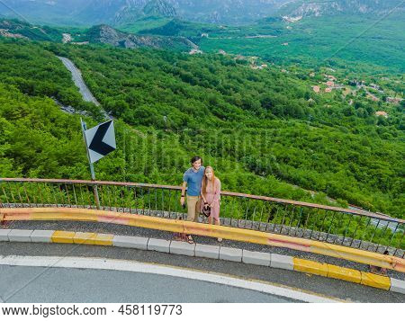 Couple Man And Woman On The Background Of Beautiful View Of The Mountains Of Montenegro And Skadar L