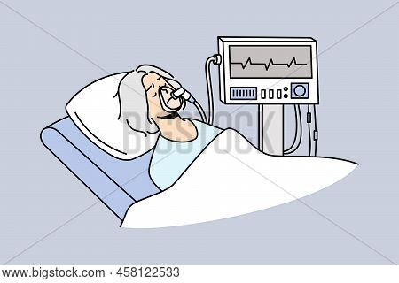 Old Woman In Mask Lying Under Ventilator In Hospital. Mature Patient Breathing With Ventilating Mach