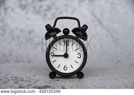 Alarm Clock Pointing At 9 Oclock With Customizable Space For Ideas Or Text. Copy Space