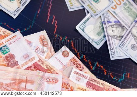 Us Dollar And Russian Ruble Banknotes Over Digital Screen With Real Life Exchange Chart, Usd Rub Dep