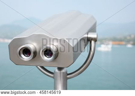 Metal Tower Viewer Installed Near Sea. Mounted Binoculars