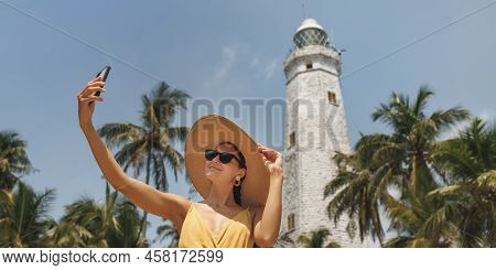 Sri Lanka Tourist Girl On Holiday Taking Selfie Photo With Phone At Famous Place Dondra Lighthouse, 