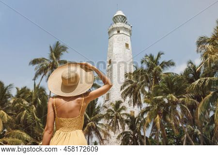 Back View Of Romantic Woman Traveler In Dress And Straw Hat Visiting Famous Landmarks Of Sri Lanka C