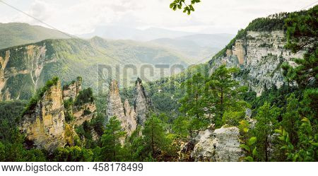 Scenic Panoramic View Sairme Pillars Landscape In Summer With Stunning Green Caucasus Mountains Back