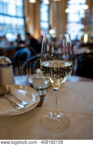 Glass Of White Dry Austrian Wine Served In Cafe In Vienna, Austria