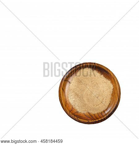 Lepidium Meyenii - Maca Powder In The Wooden Bowl