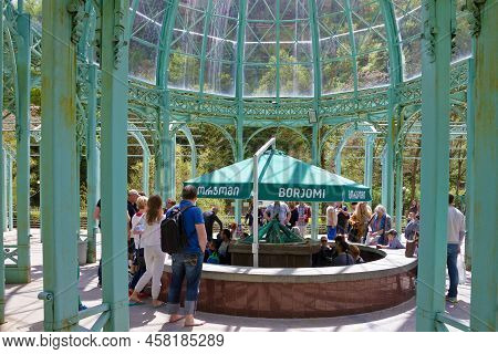 Borjomi, Georgia - July 6, 2022: People In The Park Of Famous Georgian Mineral Water Balneary Resort