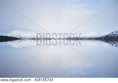 Peaceful Calm Lake During Winter At Glencoe