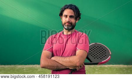 Monitor Of Padel Holding Black Racket With Copy Space. Class Of Tennis Court