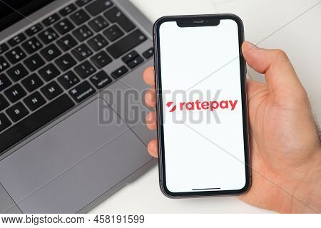 Ratepay Payment System Allows To Make Money Transfers. Online Shopping With A Smartphone And Laptop.