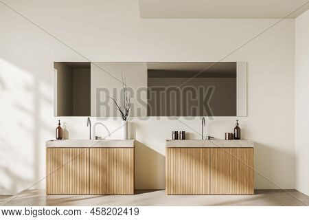 Beige Bathroom Interior With Double Sink And Large Mirror, Deck With Hotel Bathing Accessories, Ligh