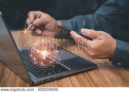 Businessman Hold Smartphones In Hand And Use Smartpens With Laptop Working In Office Are Using Creat
