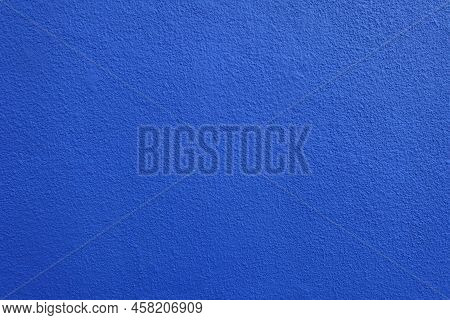 Background - Wall With Coarse Vibrant Blue Roughcast Finish