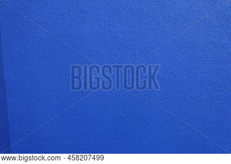 Wall With Coarse Vibrant Blue Roughcast Finish (front View)