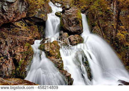 Russia. South Of Western Siberia. One Of The Many Most Beautiful Waterfalls Of The Altai Mountains O
