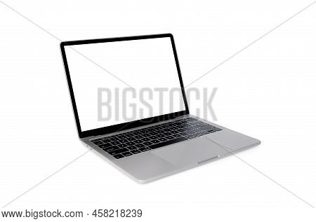 Front View Of Laptop With Blank Screen In Angled Position. Blank White Screen Display For Mockup Iso