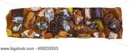 Isolated Tasty Flapjack Based Snack Bar With Chocolate, Caramel, Seeds And Nuts