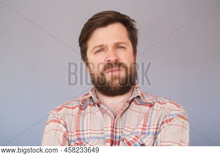 Man With Unhappy Expression As Feels Frustration, Being Upset To Hear Bad News