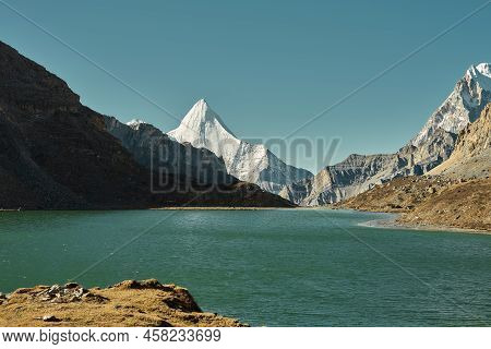Mount Jampayang And Lake Boyongcuo In Yading National Park, Daocheng County, Sichuan Province, China