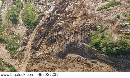 Aerial View Of Excavators On Earthwork At Construction Site. Earthworks During The Install Of Storm 