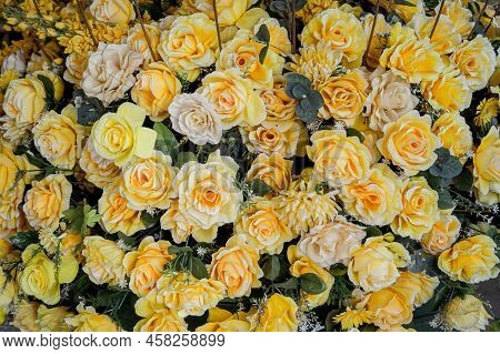 Big Bouquet Of Flowers In A Vase On A Gray Wall Background