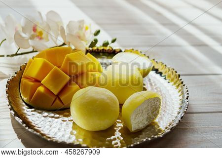 Tasty Dessert Mochi With Mango Fruit On Wooden Background, Close Up.