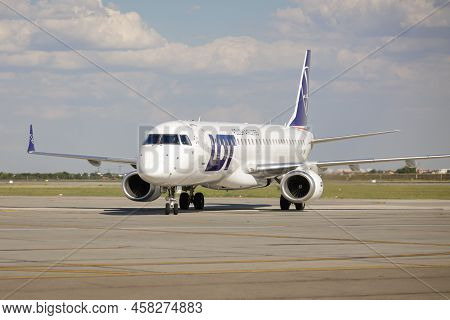 Otopeni, Romania - July 17, 2022: Lot Polish Airline Plane On The Taxiway Of The Henri Coanda Airpor