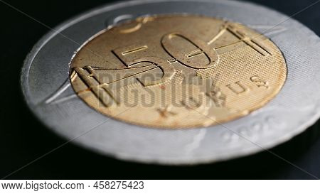 Translation: 50 Kurus. Turkish Coin Of 50 Kuruş Lies On A Black Surface Close Up. National Currency 