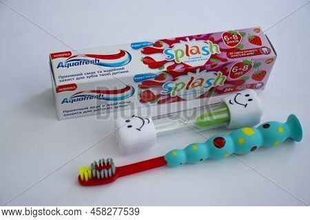 June 1, 2022 Ukraine City Kyiv Toothpaste For Children Aquafresh On A Colored Background