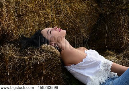 Beautiful Girl Face Closeup, Outside Portrait Of Young Woman In Sraw At Countryside. Summer Romantic