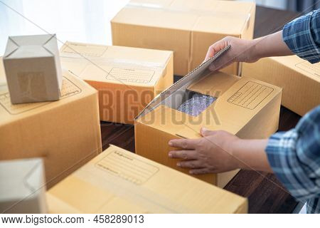 Closeup View Of Female Online Store Small Business Owner Seller Entrepreneur Packing Package Post Sh