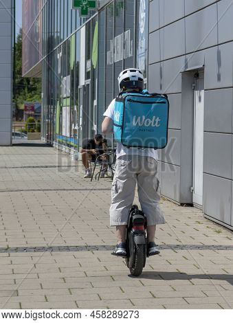 Banska Bystrica, Slovakia - July, 16 , 2022 : Wolt Courier At Work In Banska Bystrica. Food Delivery