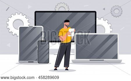 Multi Device Concept. Man With Tablet On Background Of Laptop, Computer And Other Devices. Wireless 