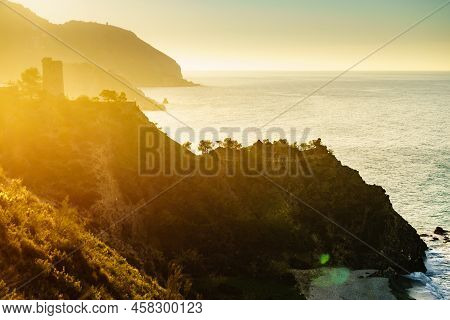 Coastal Landscape With Watchtower. Torre Del Pino, Pine Tower On Cliffs Of Maro Cerro Gordo Natural 
