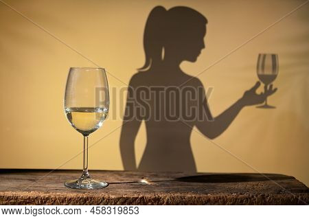 Abstract Woman Shadow With Wine Glass And  White Wine Glass