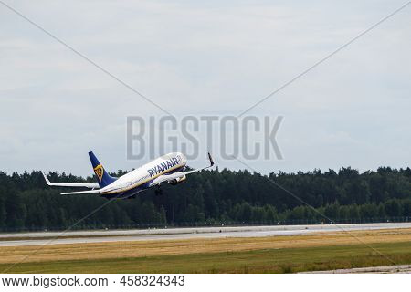 Ryanair Boeing 737-8as Takes Off From The Runway At Riga International Airport. Riga International A