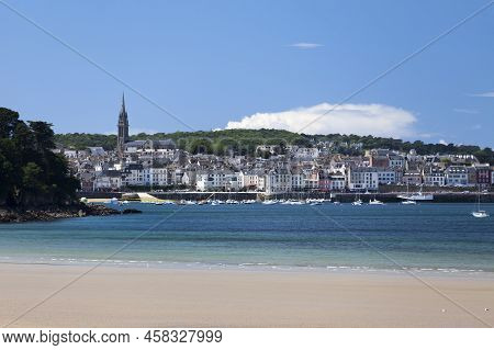 Ris Beach With The Church Of The Sacred Heart Overlooking The Town Of Douarnenez In The Background.